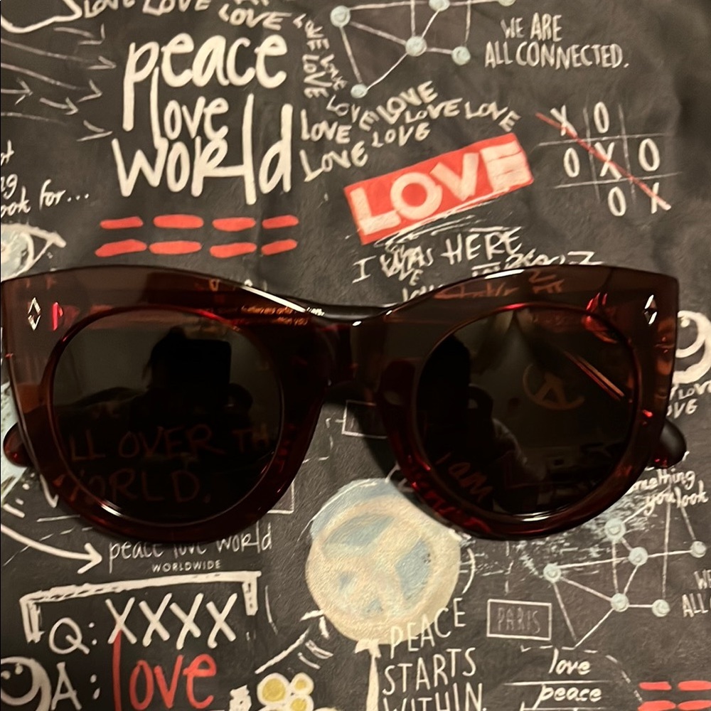 Elegant Black Sunglasses Case with Red Trim